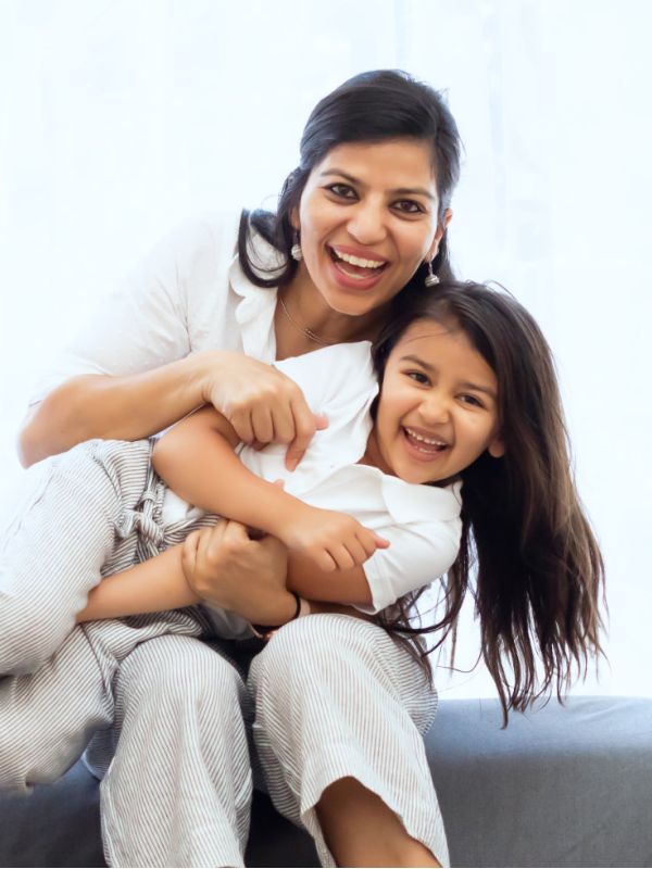 Mom and daughter laughing